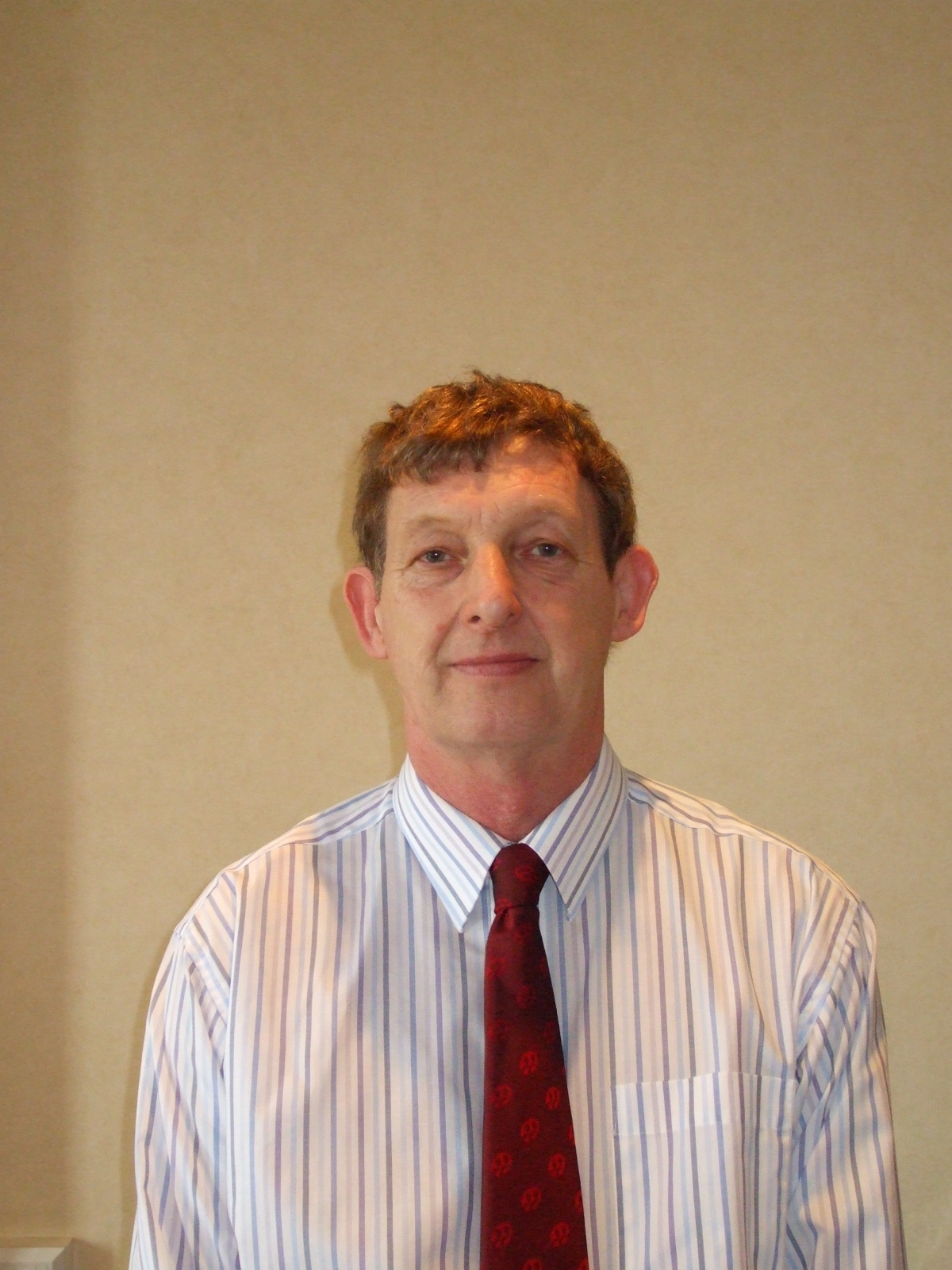A headshot of Keith Davies, Community member and former Community President.