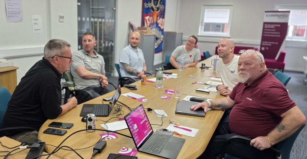 A photograph of Paul Parker, Mark McGinle, Ryan Mack, Susan Cassidy, George Milligan and Dave Birrell undergoing Community Union rep training in Glasgow.