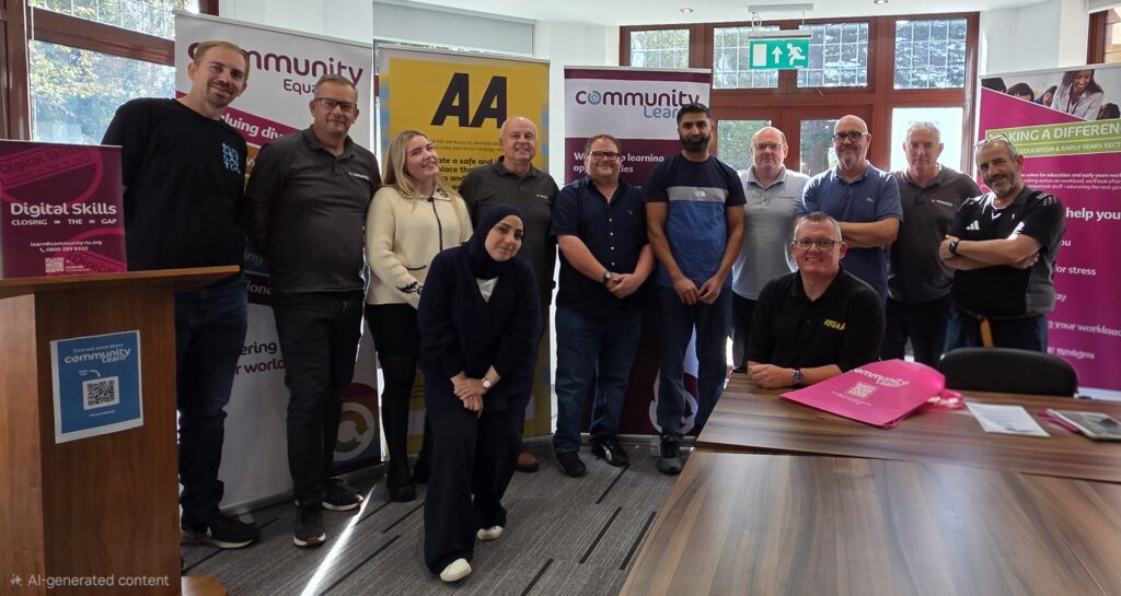 A photograph of Community Trade Union members and reps, along with AA staff at a learning event.